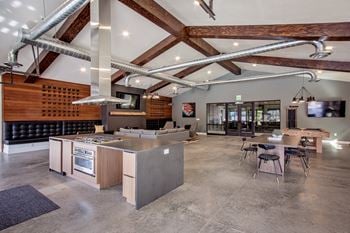 Clubhouse with fireplace and pool table
